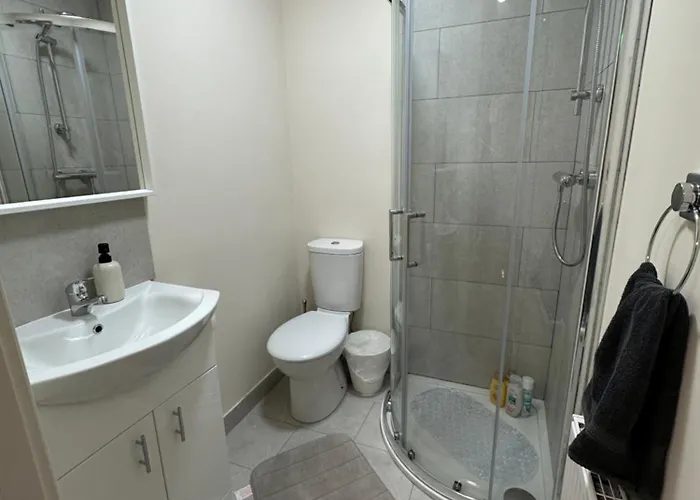 Quarto em Acomodações Particulares Suburban Haven *